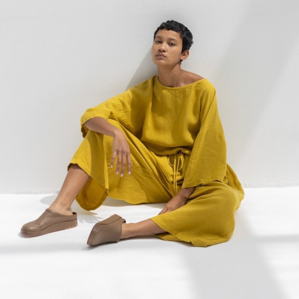 Black Crane Pea Jumpsuit in Gold